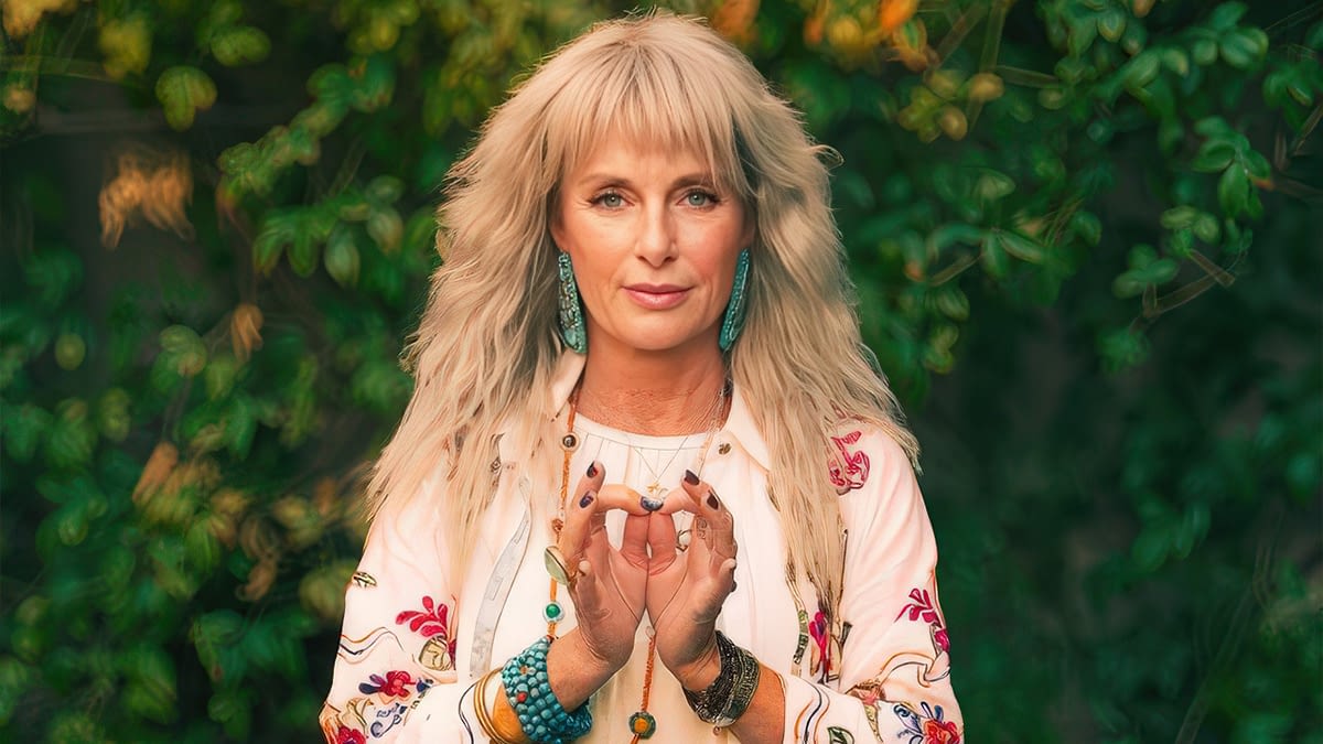 Melanie MataJi, founder of The MataJi Sanctuary, hands in mudra, Las Vegas wellness studio